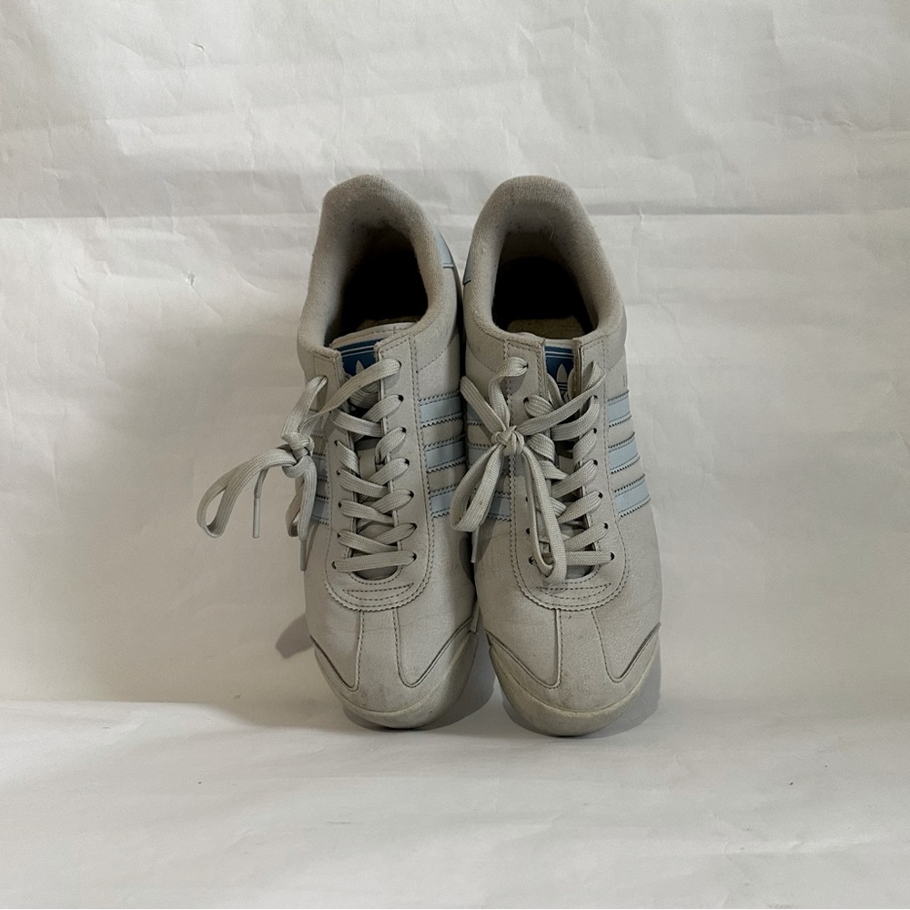 Adidas Gray Sneakers with Blue Stripes